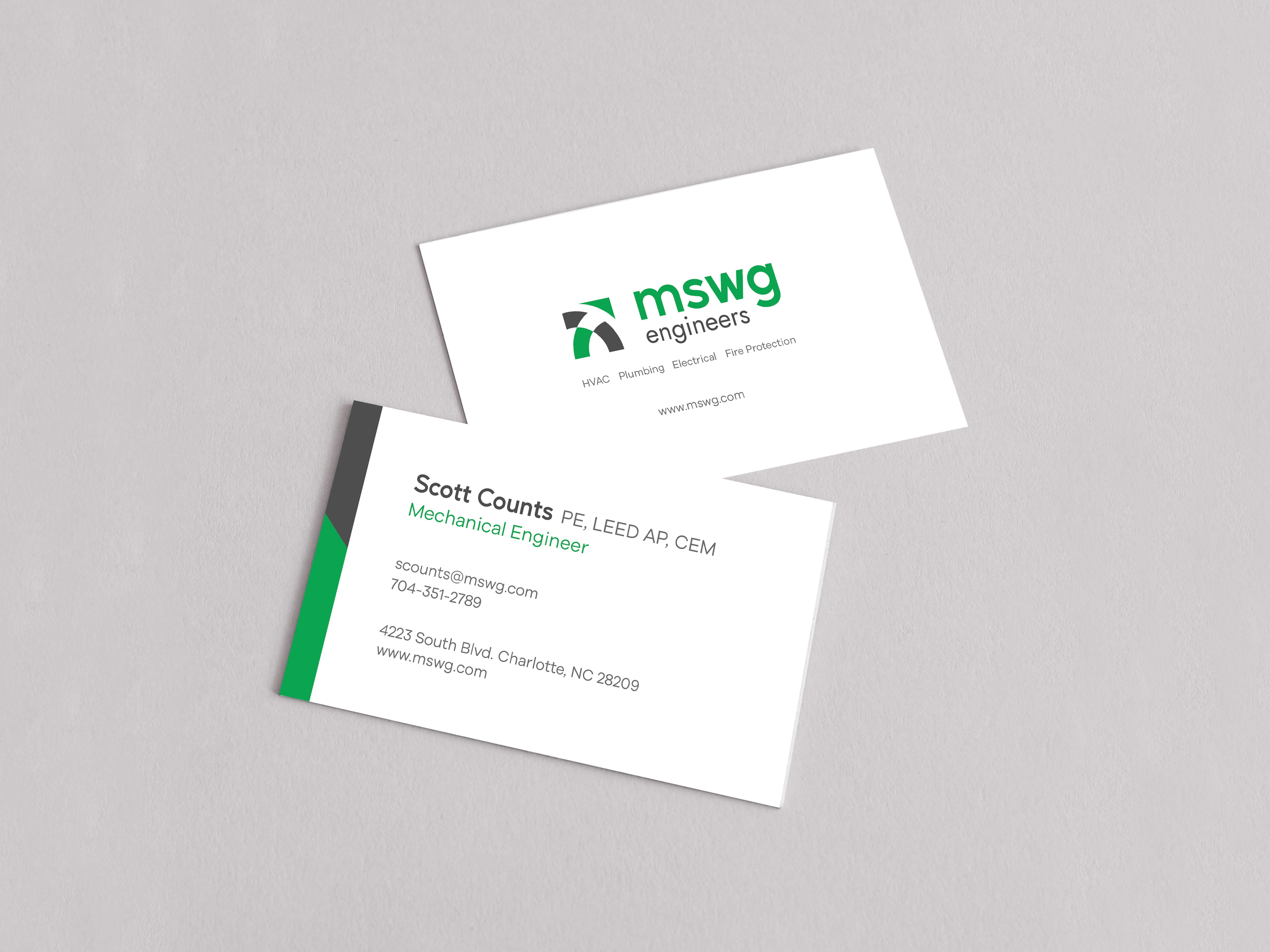 MSW Engineers business cards with the green and charcoal logo and the four engineering disciplines, designed by Ossa Studio