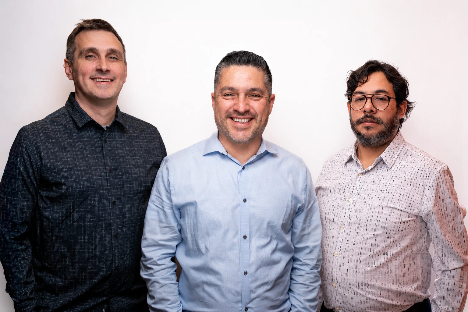 Jack Ossa with two members of the Ossa Studio team